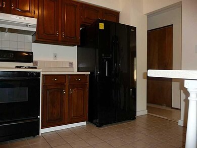 Kitchen. Nearly new, large refrigerator included.