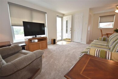 VIEW OF FRONT ENTRY INTO THE LIVING ROOM.