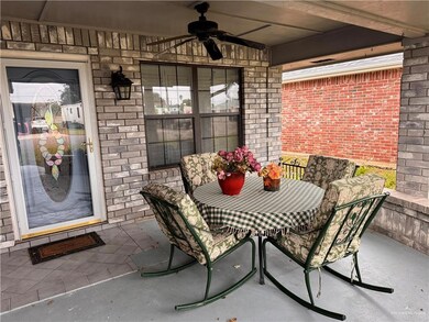 View of patio with ceiling fan