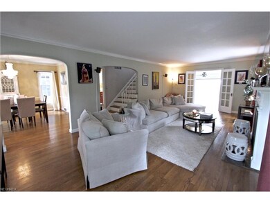 Spacious living room with plenty of natural light.