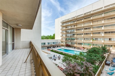Balcony with view of pool courtyard