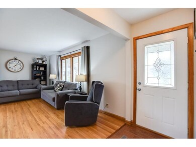 Living room features hardwood floors and south fac