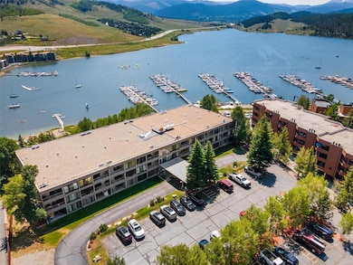 Birds eye view of property featuring a water and m