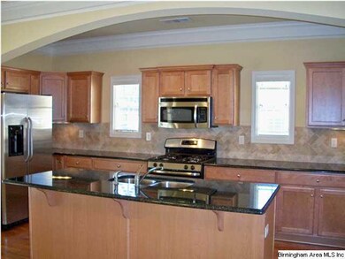 A view of the family room toward the kitchen and d