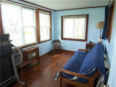 Porch - Enclosed. The enclosed porch faces south f