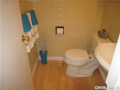 Bathroom. This half bath on the first floor is dar