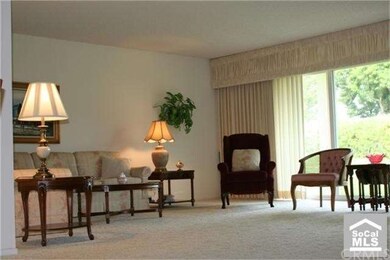 Extra large living room is private and bright