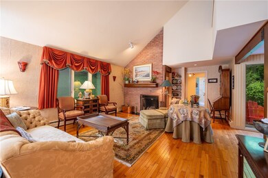 Formal Living Area w/ wood burning Fireplace