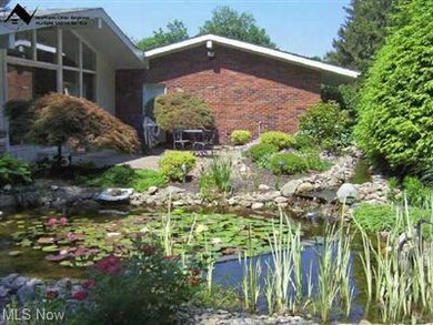Lillie pond W/water falls off encolsed patio.