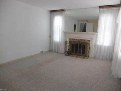 Living room with fireplace.
