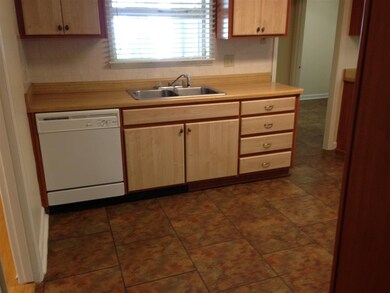 Sink, window, and Dishwasher.
