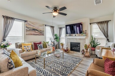 Living room with light hardwood / wood-style floor