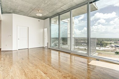 The living room has balcony access.