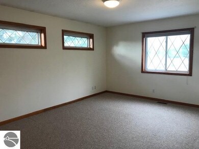 404 Bridge St, Elk Rapids, MI 49629 - photo 7