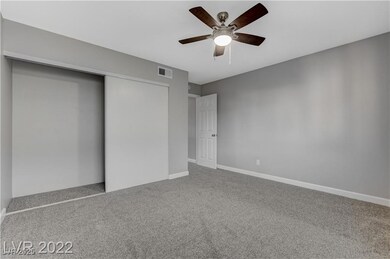 Unfurnished bedroom featuring carpet floors, a clo
