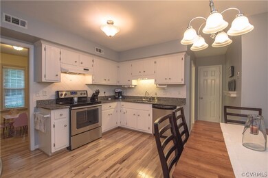 Granite countertops, stainless steel appliances in