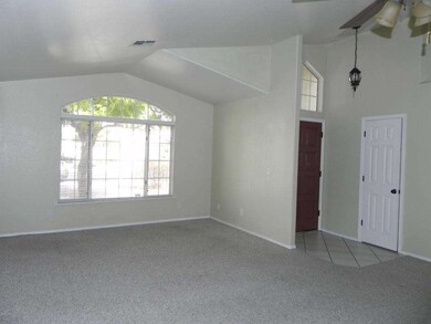 Tiled Foyer Ceiling Fan at Dining Room