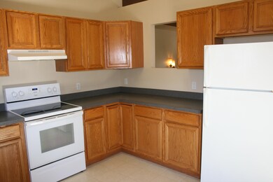 Kitchen has plenty of cupboard space.