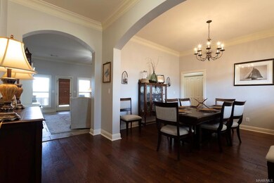 foyer looking into den and dining room