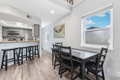 Dining room featuring light wood-type flooring and