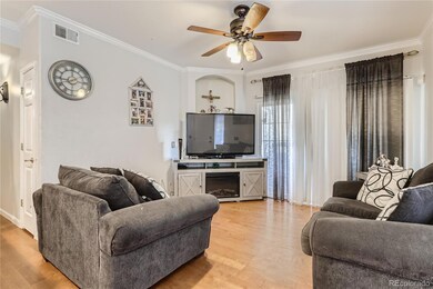 Comfortable living space with a ceiling light fan 
