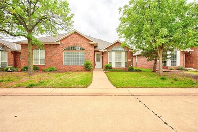 Ranch-style house featuring a front yard