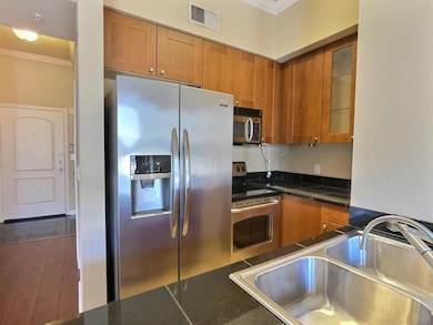 Kitchen featuring stainless steel appliances, orna