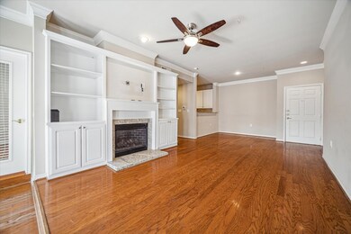 Open living room w/ fireplace