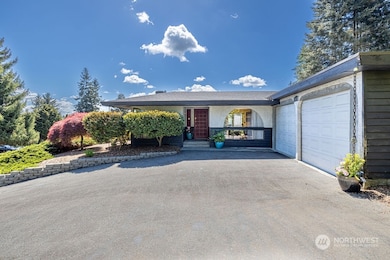 The spacious drive way has room for your guests and toys.