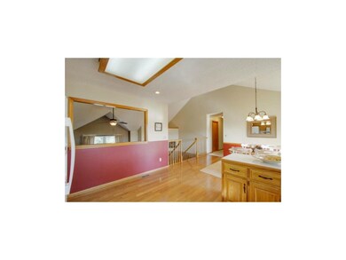 Gleaming Hardwood Floor in Kitchen