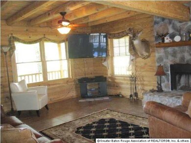 LIVINGROOM WITH WOOD BURNING FIREPLACE