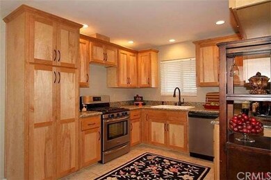 Beautiful Alder cabinets, 5 burner stainless steel