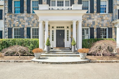 This stately Georgian colonial designed by Alex Ka