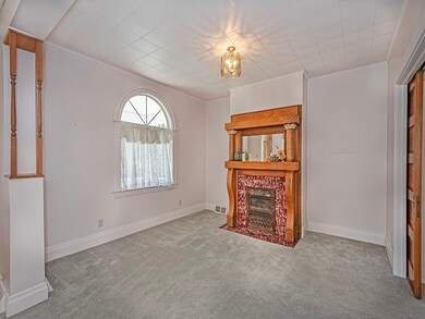 Living Room is anchored by a character-filled fire