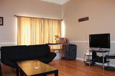 Living area with wood finished floors