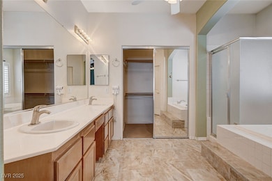 Master Bath features dual sinks, makeup table, sep