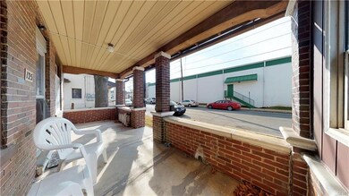 Covered Front Porch - conveniently located behind 