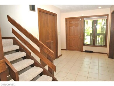The large foyer offers ceramic tile flooring and l