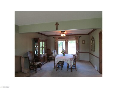 Formal Dining Room w/Crown Molding & Chair Rail