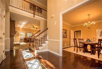 A grand entrance with brand new hardwood floors in