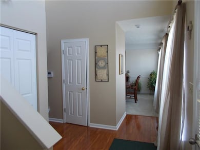 FOYER VIEW INTO DINING ROOM