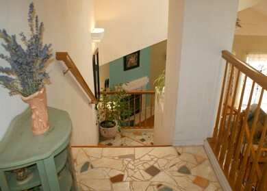 Stairway Overlooks Greatroom