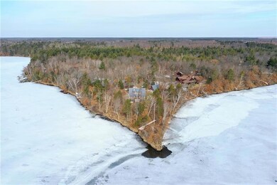 Aerial view of point and cabin.