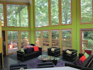 Spectacular Great Room with view of deck and natur