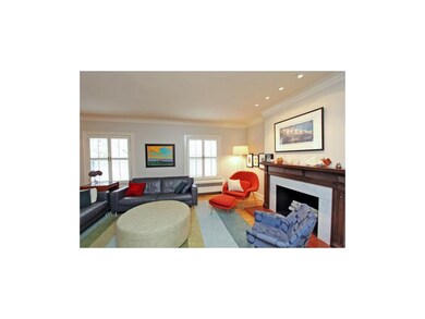 Living Room- Hardwoods, Plantation Shutters, Firep