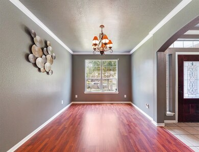 Formal dining w/gorgeous wood floors