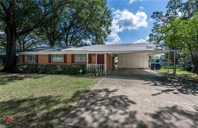 ANOTHER VIEW OF THE FRONT EXTERIOR** 2 CAR CARPORT