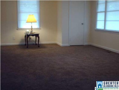 Greatroom with new carpet and paint and showing co