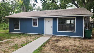 View of front of property with a shingled roof