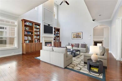Family Room-notice two fireplace - Virtually Stage